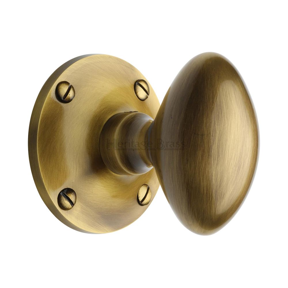 This is an image of a Heritage Brass - Mortice Knob on Rose Mayfair Design Antique Brass Finish, may960-at that is available to order from T.H Wiggans Ironmongery in Kendal.