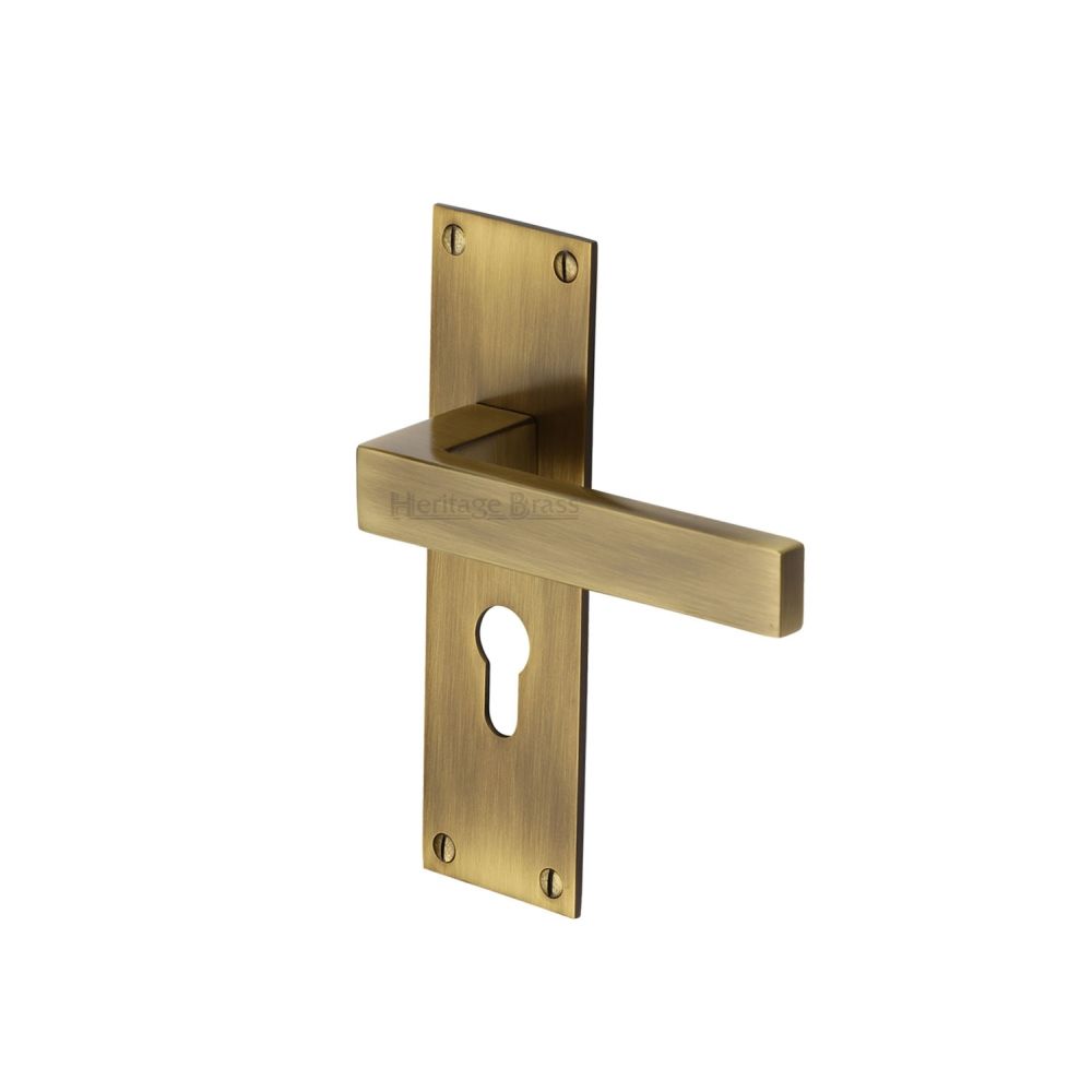 This is an image of a Heritage Brass - Door Handle for Euro Profile Plate Metro Design Antique Brass Fini, met4948-at that is available to order from T.H Wiggans Ironmongery in Kendal.