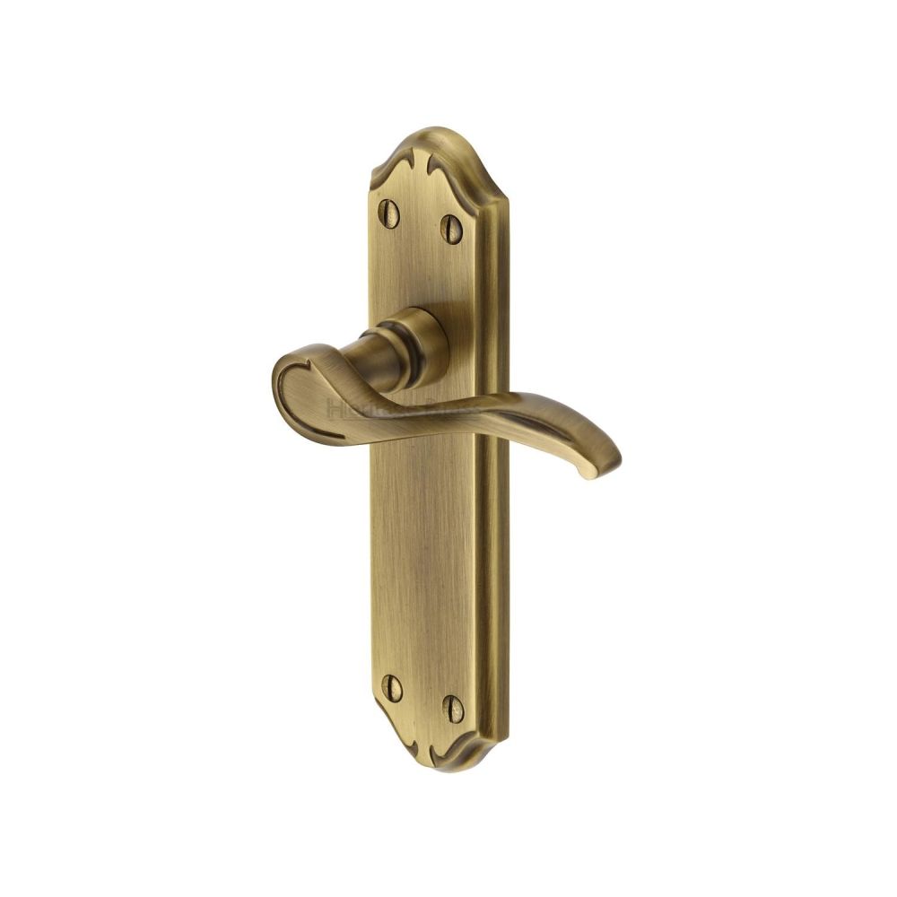 This is an image of a Heritage Brass - Door Handle Lever Latch Verona Small Design Antique Brass Finish, mm627-at that is available to order from T.H Wiggans Ironmongery in Kendal.