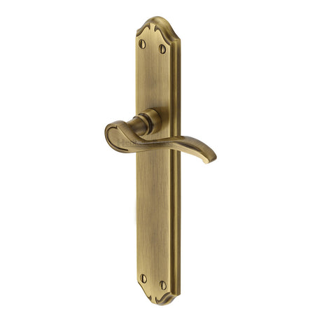 This is an image of a Heritage Brass - Door Handle Lever Latch Verona Long Design Antique Brass finish, mm827-at that is available to order from T.H Wiggans Ironmongery in Kendal.