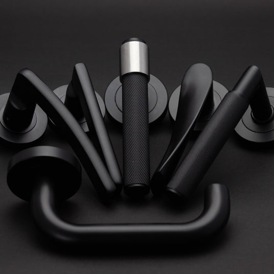 Image showing the Nero range of door handles in Matt Black by Frelan Hardware. Available to order from T.H Wiggans Ironmongery in Kendal