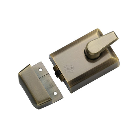 This is an image of a York - 60mm Roller Bolt Nightlatch Antique Brass Finish, nl-r3060-at that is available to order from T.H Wiggans Ironmongery in Kendal.