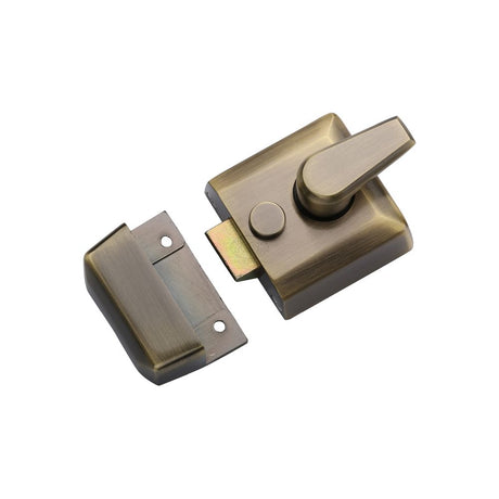 This is an image of a York - 40mm Std. Nightlatch Antique Brass Finish, nl3040-at that is available to order from T.H Wiggans Ironmongery in Kendal.