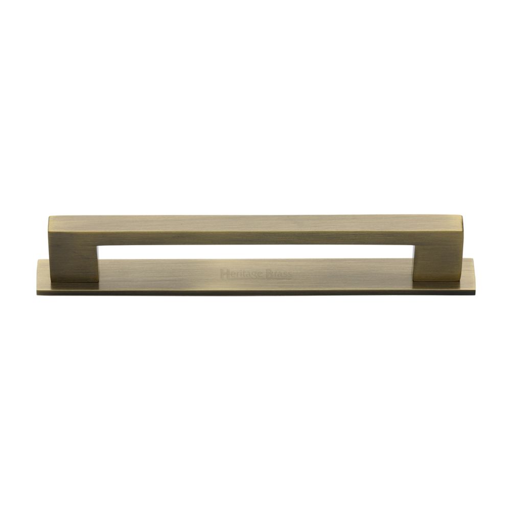 This is an image of a Heritage Brass - Cabinet Pull Metro Design with Plate 160mm CTC Antique Brass Finis, pl0337-160-at that is available to order from T.H Wiggans Ironmongery in Kendal.