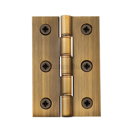 This is an image of a Heritage Brass - Hinge Brass with Phosphor Washers 3" x 2" Antique Brass Finish, pr88-400-at that is available to order from T.H Wiggans Ironmongery in Kendal.