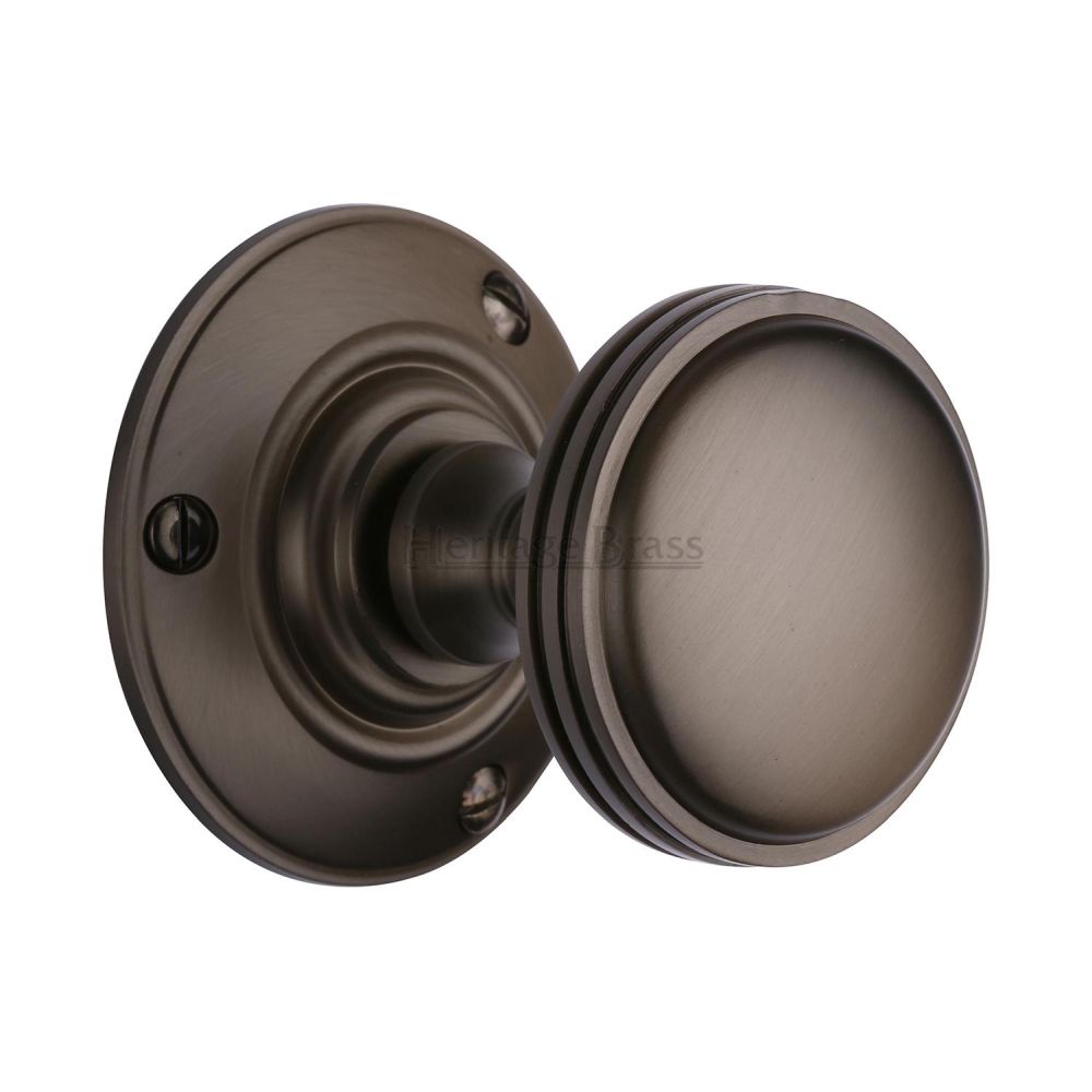 This is an image of a Heritage Brass - Mortice Knob on Rose Richmond Design Matt Bronze Finish, rhm988-mb that is available to order from T.H Wiggans Ironmongery in Kendal.