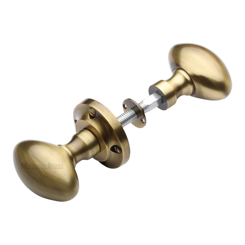 This is an image of a Heritage Brass - Suffolk Rim Knob Antique Brass Finish, rim-v960-at that is available to order from T.H Wiggans Ironmongery in Kendal.
