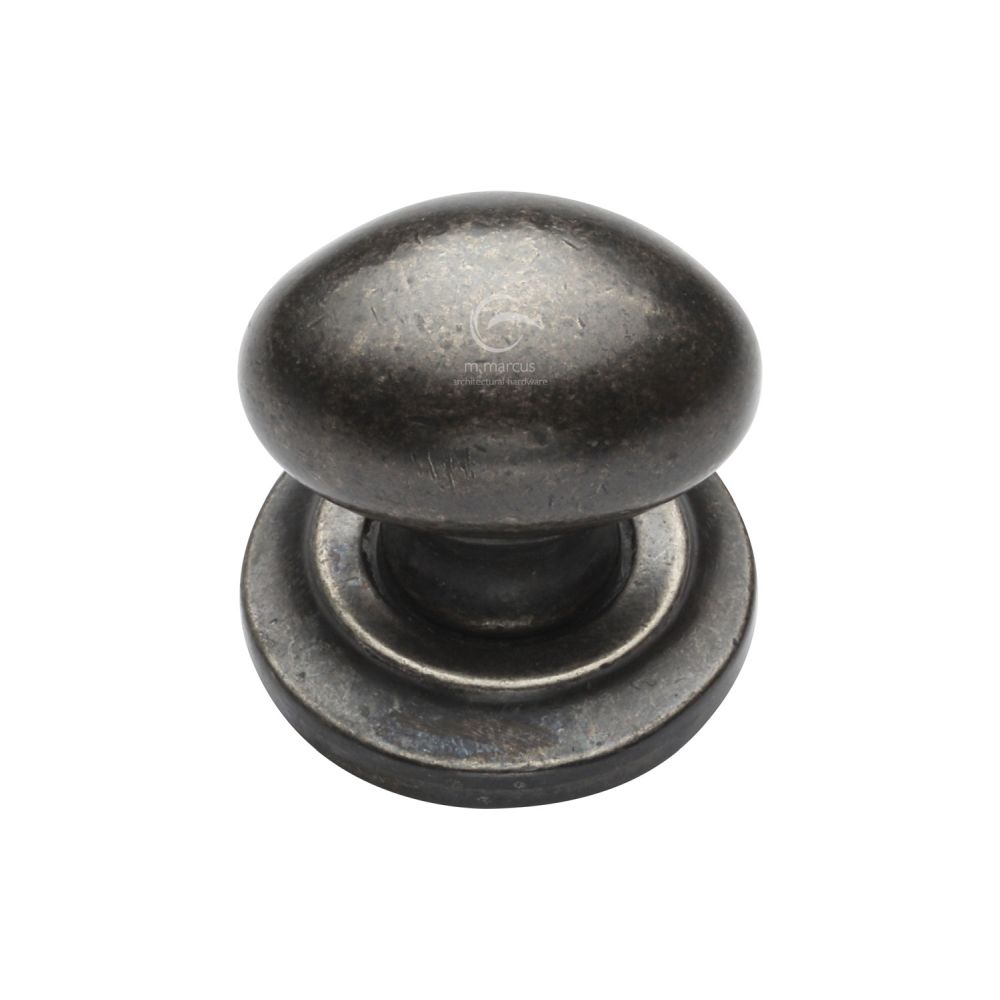 This is an image of a M.Marcus - Rustic Pewter Cabinet Knob Oval Design on Rose 32mm, rpw179-32 that is available to order from T.H Wiggans Ironmongery in Kendal.