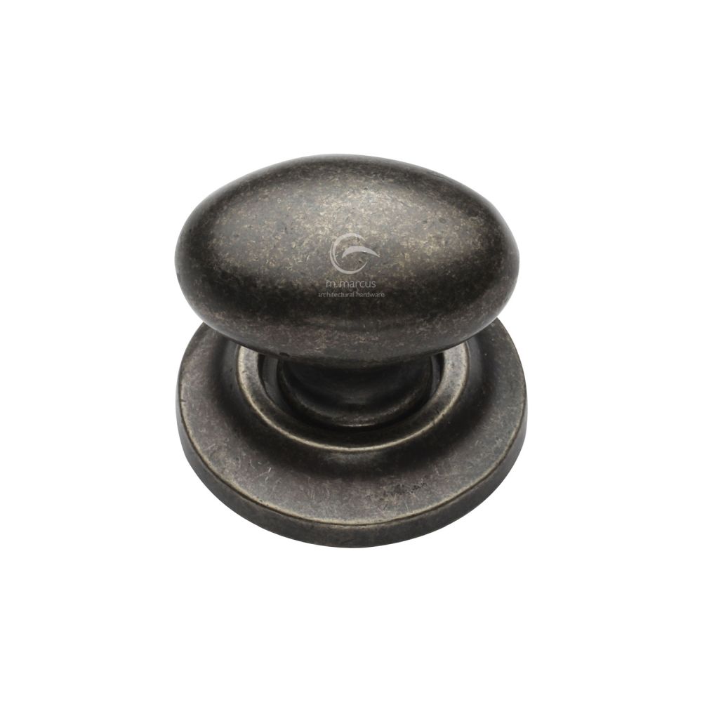 This is an image of a M.Marcus - Rustic Pewter Cabinet Knob Oval Design on Rose 38mm, rpw179-38 that is available to order from T.H Wiggans Ironmongery in Kendal.