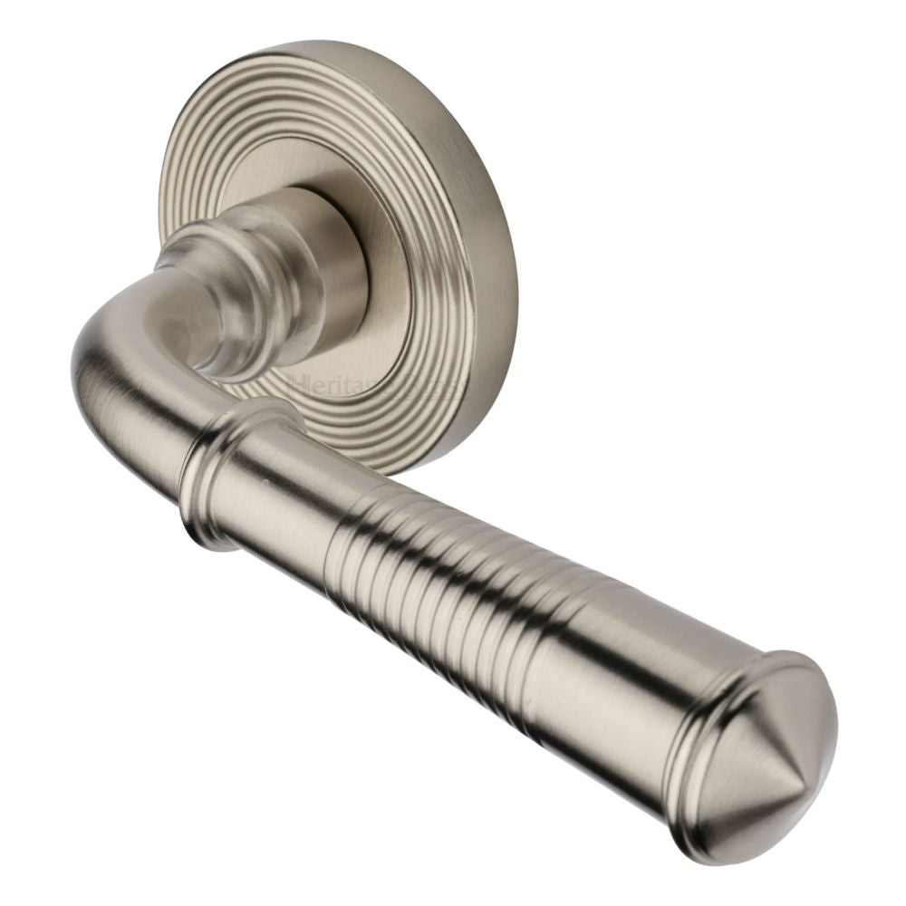 This is an image of a Heritage Brass - Door Handle Lever Latch on Round Rose Bridgetown Reeded Design, rr1935-sn that is available to order from T.H Wiggans Ironmongery in Kendal.