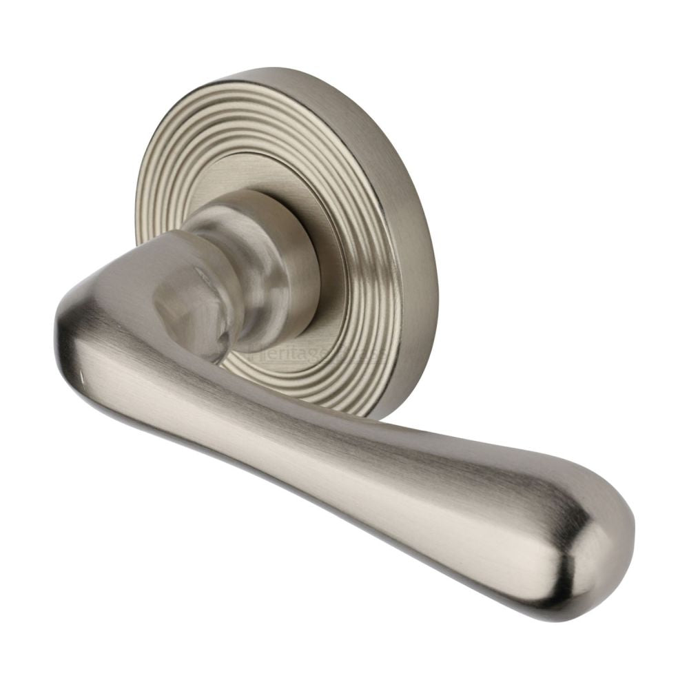 This is an image of a Heritage Brass - Door Handle Lever Latch on Round Rose Charlbury Reeded Design S, rr3022-sn that is available to order from T.H Wiggans Ironmongery in Kendal.