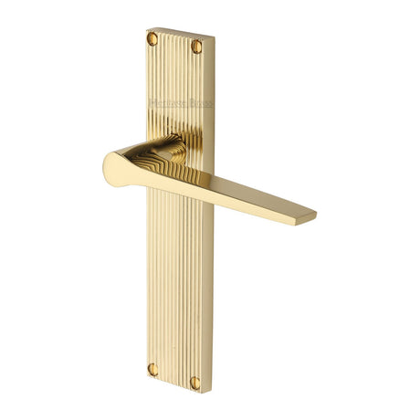 This is an image of a Heritage Brass - Gio Reeded Lever Latch Polished Brass finish, rr4710-pb that is available to order from T.H Wiggans Ironmongery in Kendal.