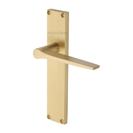 This is an image of a Heritage Brass - Gio Reeded Lever Latch Satin Brass finish, rr4710-sb that is available to order from T.H Wiggans Ironmongery in Kendal.