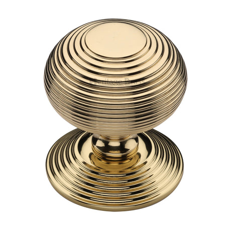 This is an image of a Heritage Brass - Centre Door Knob Reeded Design 3 1/2 Polished Brass Finish, rr906-pb that is available to order from T.H Wiggans Ironmongery in Kendal.