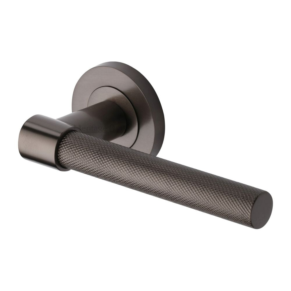 This is an image of a Heritage Brass - Door Handle Lever on Rose Phoenix Knurled Design Matt Bronze Fi, rs2018-mb that is available to order from T.H Wiggans Ironmongery in Kendal.