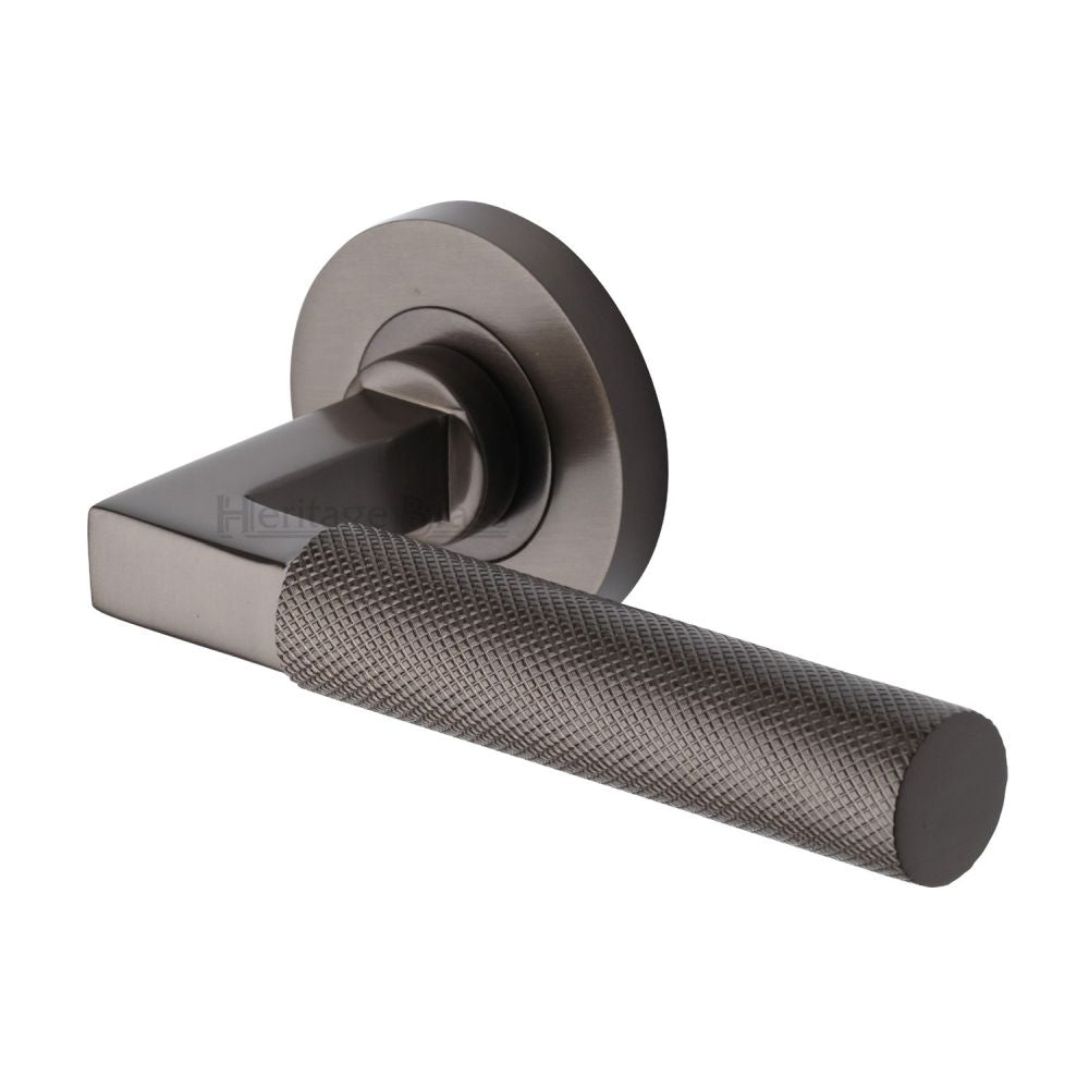 This is an image of a Heritage Brass - Door Handle Lever on Rose Signac (Knurled Bauhaus) Design Matt, rs2260-mb that is available to order from T.H Wiggans Ironmongery in Kendal.