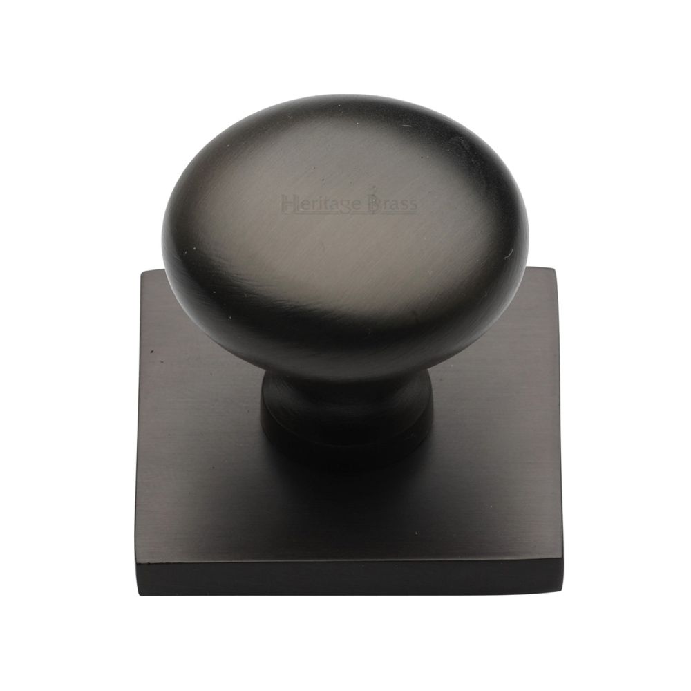This is an image of a Heritage Brass - Cabinet Knob Victorian Round Design with Square Backplate 32mm, sq113-mb that is available to order from T.H Wiggans Ironmongery in Kendal.