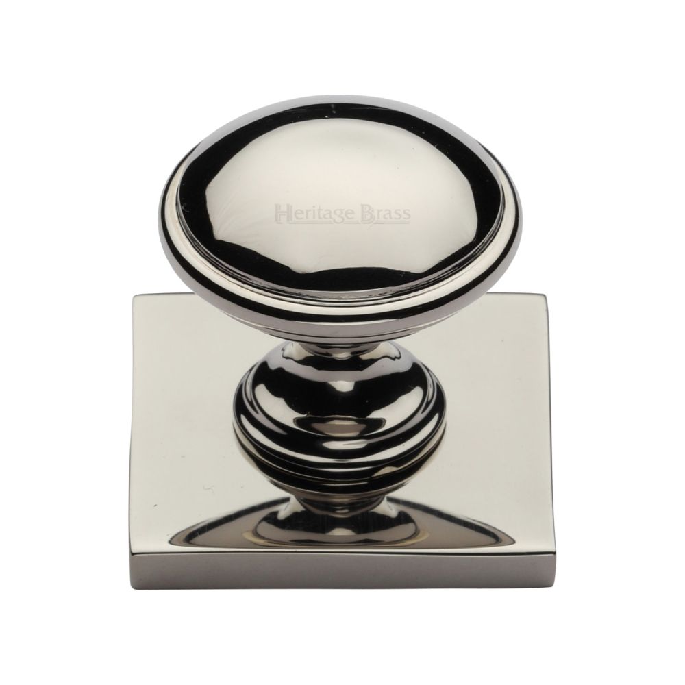 This is an image of a Heritage Brass - Cabinet Knob Domed Design with Square Backplate 32mm Polished Nicke, sq3950-pnf that is available to order from T.H Wiggans Ironmongery in Kendal.