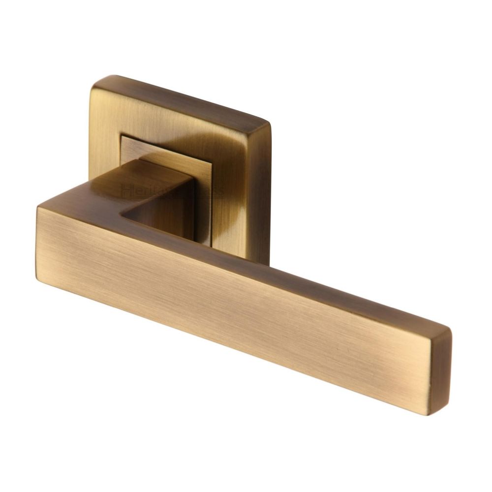 This is an image of a Heritage Brass - Door Handle Lever Latch on Square Rose Delta Sq Design Antique Bra, sq5420-at that is available to order from T.H Wiggans Ironmongery in Kendal.