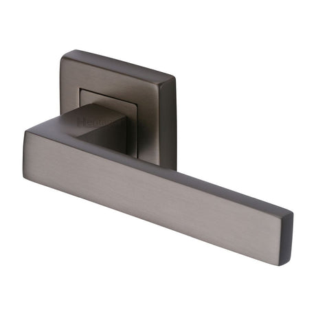 This is an image of a Heritage Brass - Door Handle Lever Latch on Square Rose Delta Sq Design Matt Bro, sq5420-mb that is available to order from T.H Wiggans Ironmongery in Kendal.