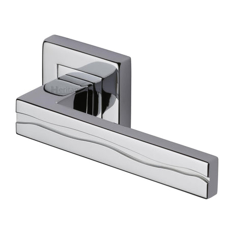 This is an image of a Heritage Brass - Door Handle Lever Latch on Square Rose Amazon Sq Design Polished Chrome finish, sq5440-pc that is available to order from T.H Wiggans Ironmongery in Kendal.