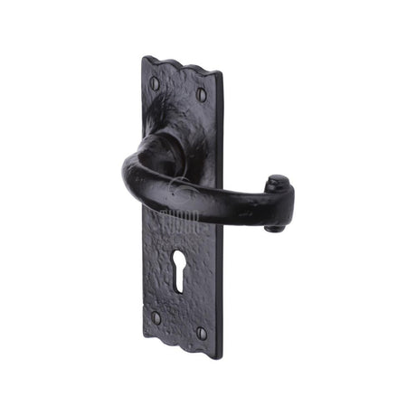 This is an image of a The Tudor Collection - Door Handle Lever Lock Colonial Design Black Iron, tc300 that is available to order from T.H Wiggans Ironmongery in Kendal.