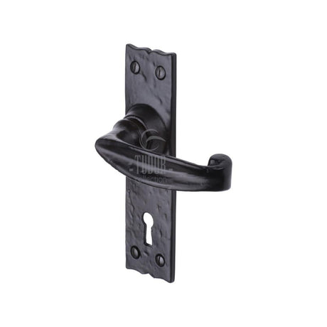 This is an image of a The Tudor Collection - Door Handle Lever Lock Wellington Design Black Iron, tc600 that is available to order from T.H Wiggans Ironmongery in Kendal.