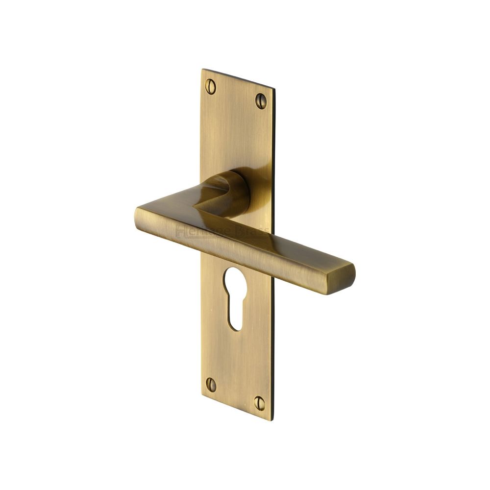 This is an image of a Heritage Brass - Door Handle Euro Profile Plate Trident Design Antique Brass Finish, tri1348-at that is available to order from T.H Wiggans Ironmongery in Kendal.