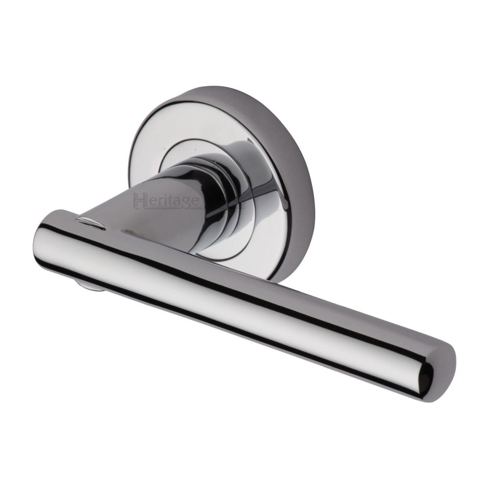 This is an image of a Heritage Brass - Door Handle Lever Latch on Round Rose Challenger Design Polished Ch, v1001-pc that is available to order from T.H Wiggans Ironmongery in Kendal.