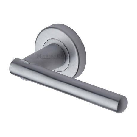 This is an image of a Heritage Brass - Door Handle Lever Latch on Round Rose Challenger Design Satin Ch, v1001-sc that is available to order from T.H Wiggans Ironmongery in Kendal.