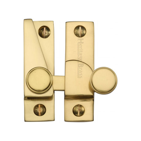 This is an image of a Heritage Brass - Sash Fastener Polished Brass Finish, v1106-pb that is available to order from T.H Wiggans Ironmongery in Kendal.