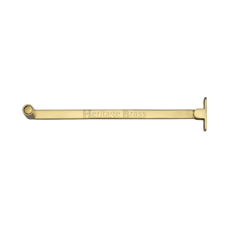 This is an image of a Heritage Brass - Roller Arm Stay 254mm Polished Brass Finish, v1119-10-pb that is available to order from T.H Wiggans Ironmongery in Kendal.