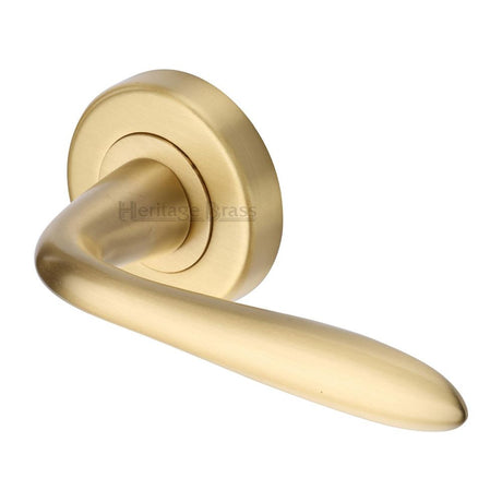 This is an image of a Heritage Brass - Door Handle Lever Latch on Round Rose Sutton Design Satin Brass, v1750-sb that is available to order from T.H Wiggans Ironmongery in Kendal.