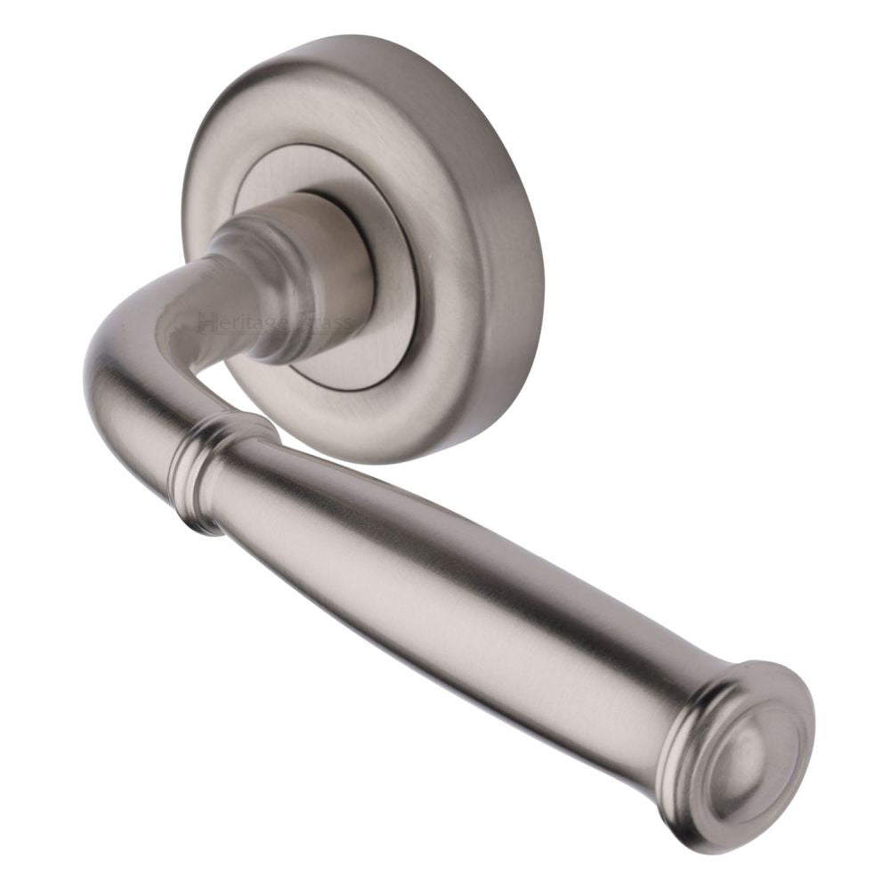 This is an image of a Heritage Brass - Door Handle Lever Latch on Round Rose Lincoln Design Satin Nicke, v1938-sn that is available to order from T.H Wiggans Ironmongery in Kendal.