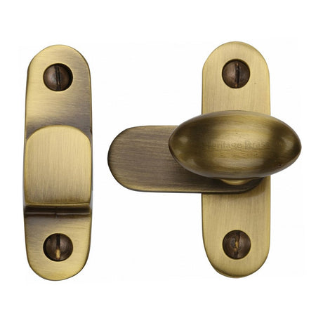 This is an image of a Heritage Brass - Showcase Fastener Antique Brass Finish, v1970-at that is available to order from T.H Wiggans Ironmongery in Kendal.