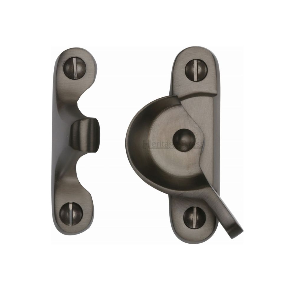 This is an image of a Heritage Brass - Fitch Pattern Sash Fastener Matt Bronze Finish, v2060-mb that is available to order from T.H Wiggans Ironmongery in Kendal.
