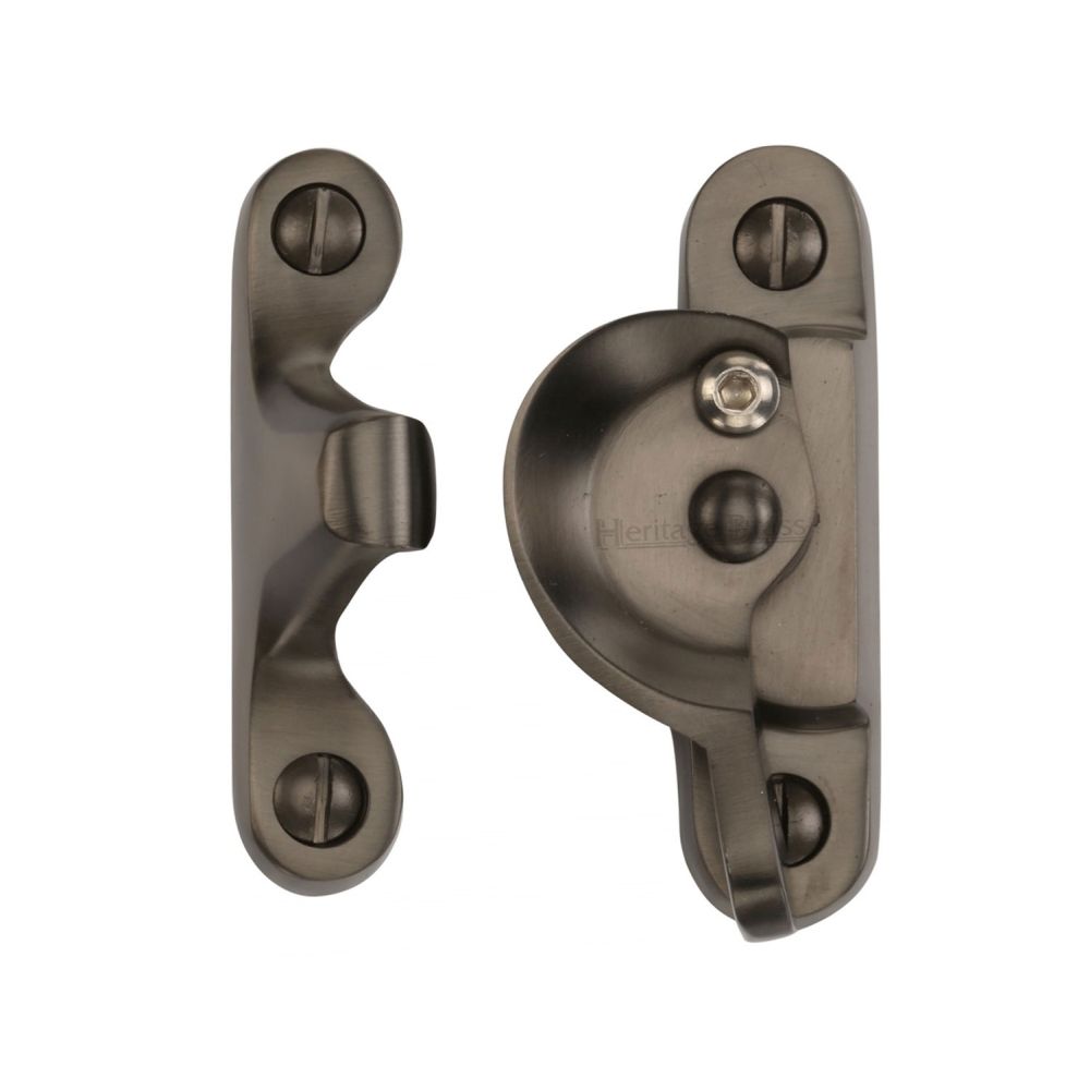 This is an image of a Heritage Brass - Fitch Pattern Sash Fastener Lockable Matt Bronze Finish, v2060l-mb that is available to order from T.H Wiggans Ironmongery in Kendal.