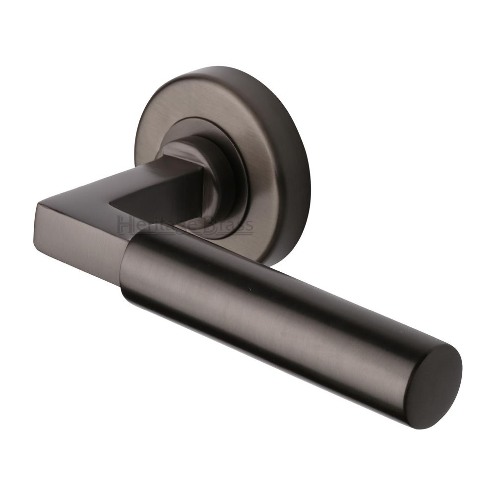 This is an image of a Heritage Brass - Door Handle Lever on Rose Bauhaus Design Matt Bronze Finish, v2259-mb that is available to order from T.H Wiggans Ironmongery in Kendal.