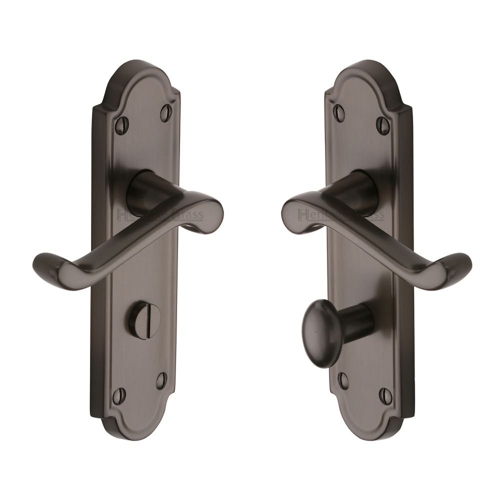 This is an image of a Heritage Brass - Door Handle Bathroom Set Meridian Design Matt Bronze Finish, v330-mb that is available to order from T.H Wiggans Ironmongery in Kendal.
