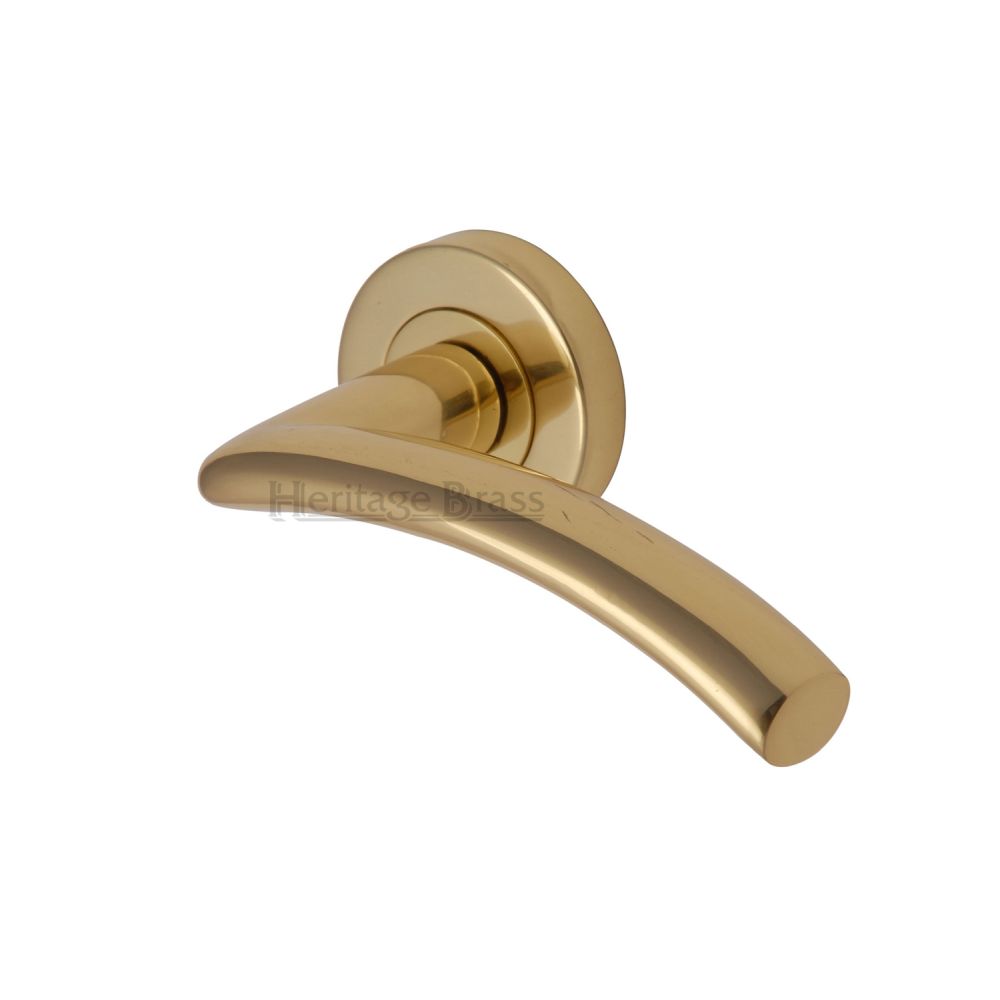 This is an image of a Heritage Brass - Door Handle Lever Latch on Round Rose Centaur Design Polished Brass, v3490-pb that is available to order from T.H Wiggans Ironmongery in Kendal.