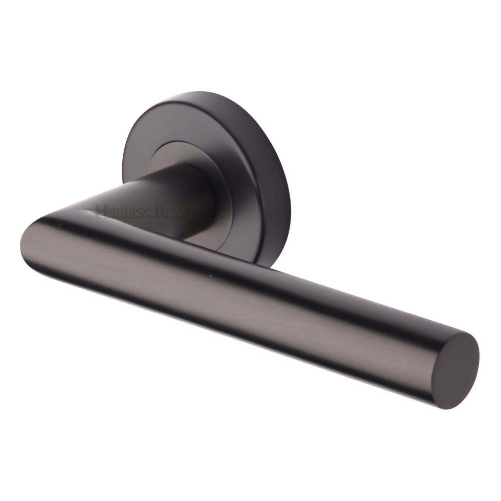 This is an image of a Heritage Brass - Door Handle Lever Latch on Round Rose Athena Design Matt Bronze, v3840-mb that is available to order from T.H Wiggans Ironmongery in Kendal.