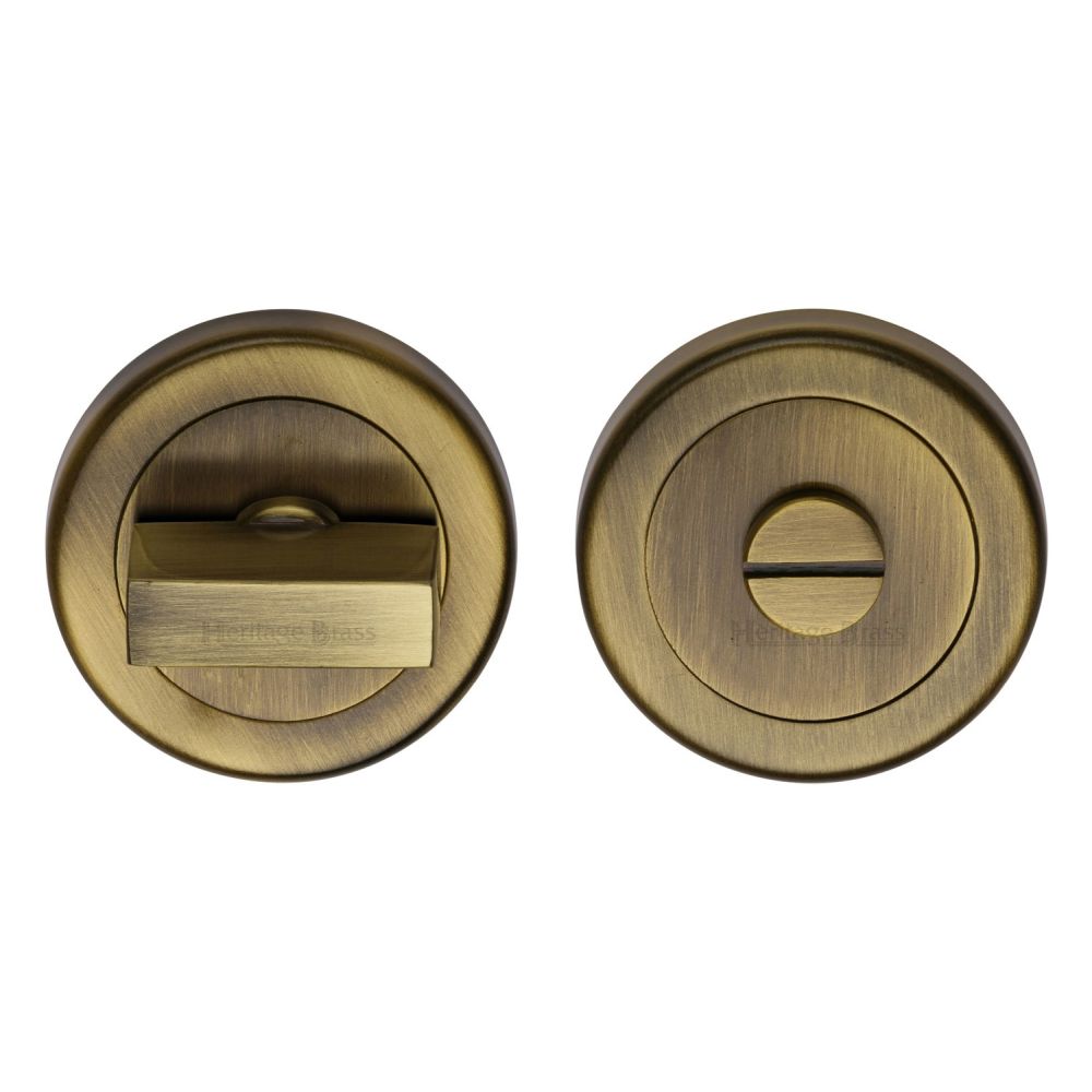 This is an image of a Heritage Brass - Thumbturn & Emergency Release Antique Brass Finish, v4035-at that is available to order from T.H Wiggans Ironmongery in Kendal.