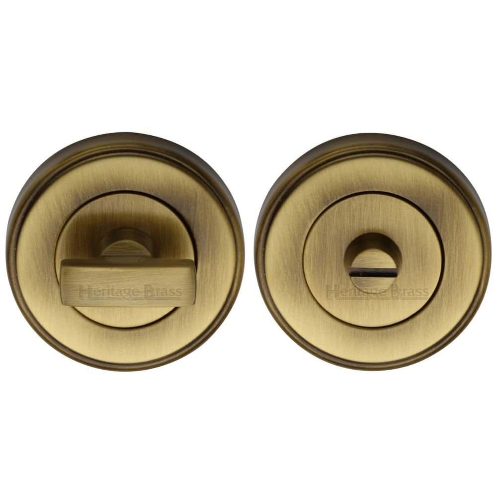 This is an image of a Heritage Brass - Thumbturn & Emergency Release Antique Brass Finish, v4040-at that is available to order from T.H Wiggans Ironmongery in Kendal.