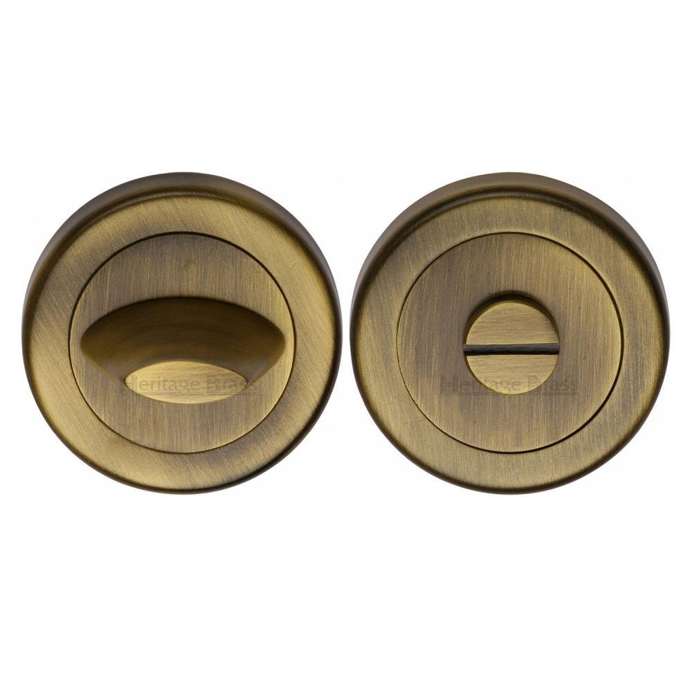 This is an image of a Heritage Brass - Thumbturn & Emergency Release for Bathroom & Bedroom Doors Antique, v4043-at that is available to order from T.H Wiggans Ironmongery in Kendal.