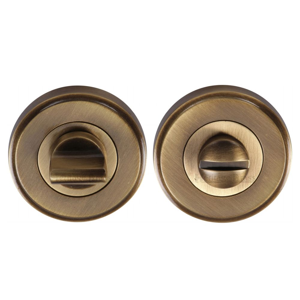 This is an image of a Heritage Brass - Thumbturn & Emergency Release Antique Brass Finish, v4045-at that is available to order from T.H Wiggans Ironmongery in Kendal.