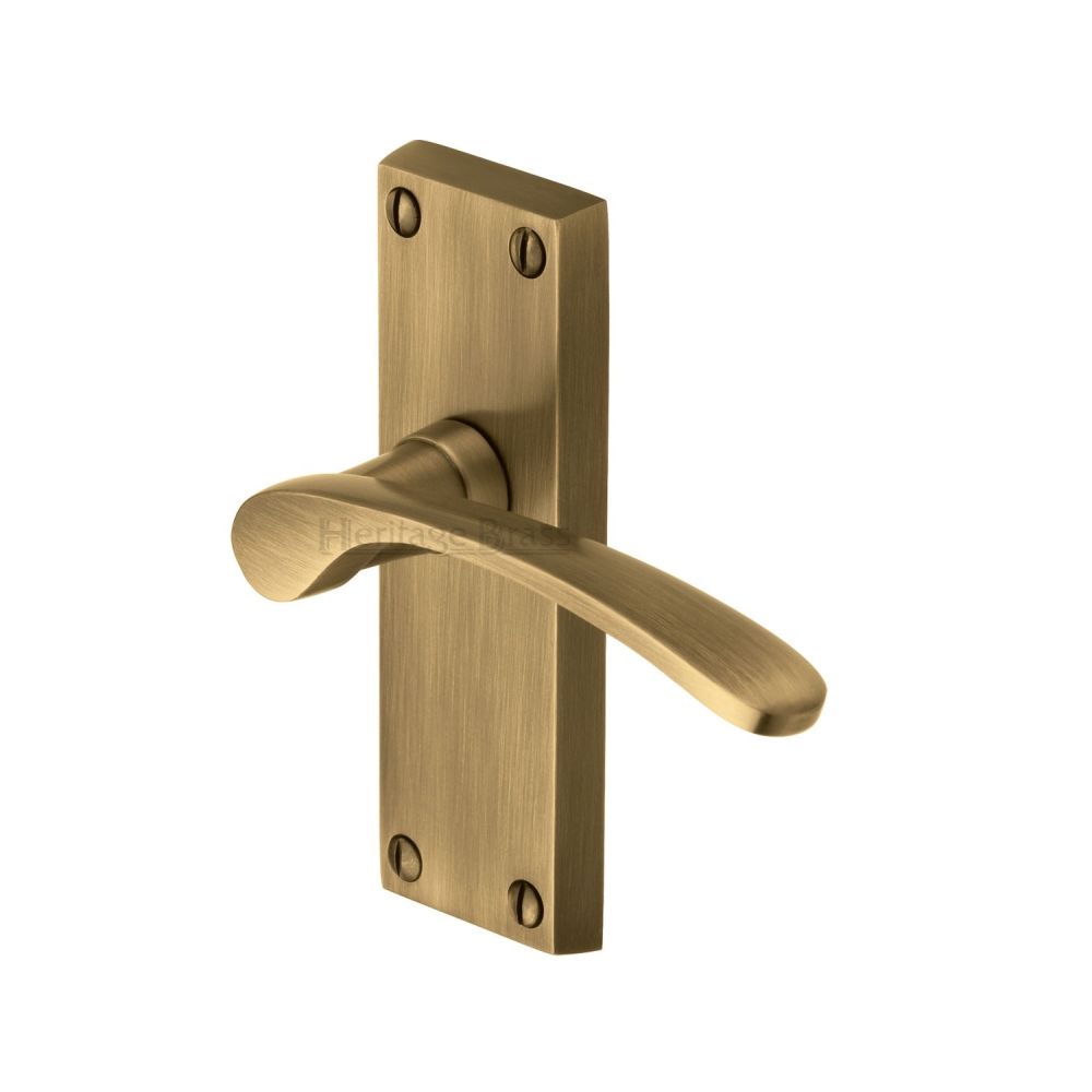 This is an image of a Heritage Brass - Door Handle Lever Latch Sophia Short Design Antique Brass Finish, v4140-at that is available to order from T.H Wiggans Ironmongery in Kendal.
