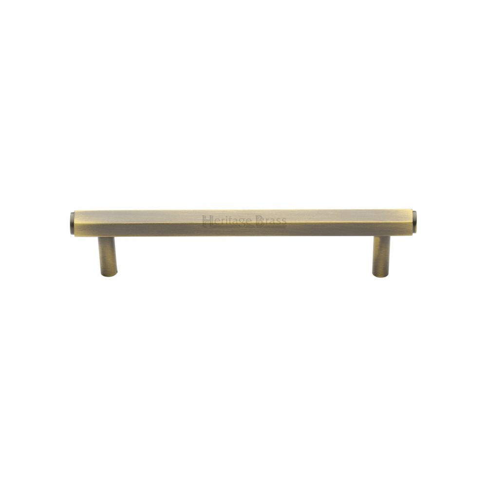This is an image of a Heritage Brass - Cabinet Pull Hexagon Design 128mm CTC Antique Brass Finish, v4422-128-at that is available to order from T.H Wiggans Ironmongery in Kendal.
