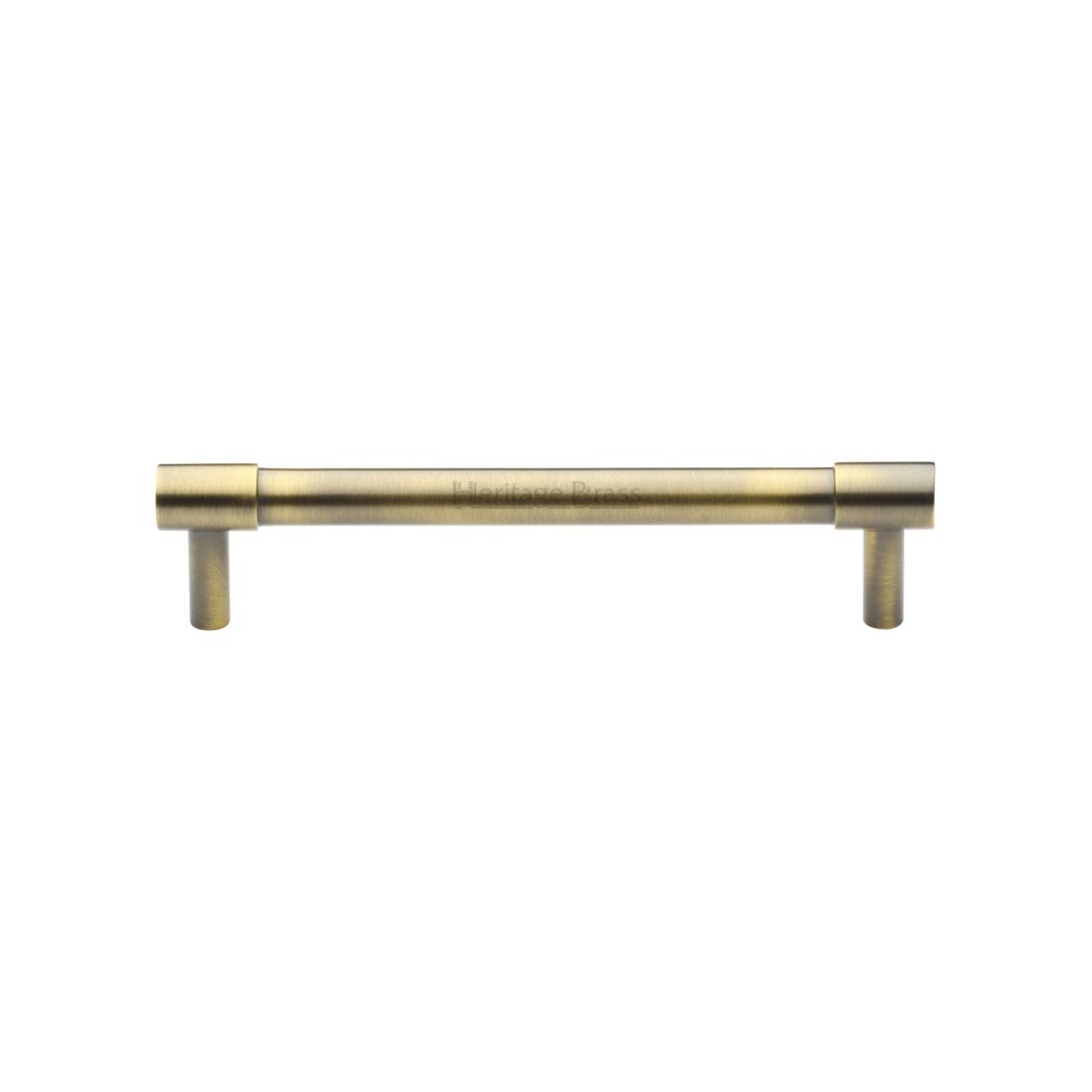 This is an image of a Heritage Brass - Cabinet Pull Phoenix Design 128mm CTC Antique Brass Finish, v4434-128-at that is available to order from T.H Wiggans Ironmongery in Kendal.