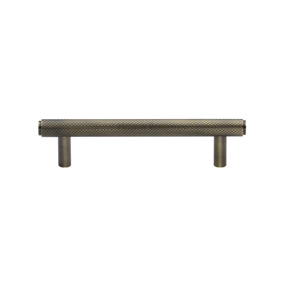 This is an image of a Heritage Brass - Cabinet Pull Knurled Design 96mm CTC Antique Brass Finish, v4458-96-at that is available to order from T.H Wiggans Ironmongery in Kendal.