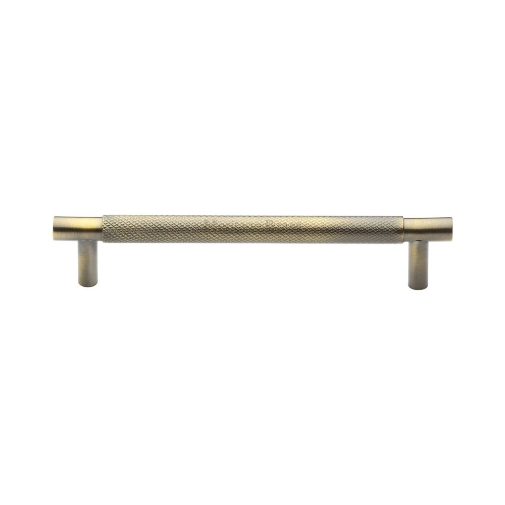 This is an image of a Heritage Brass - Cabinet Pull Partial Knurled Design 128mm CTC Antique Brass Finish, v4461-128-at that is available to order from T.H Wiggans Ironmongery in Kendal.
